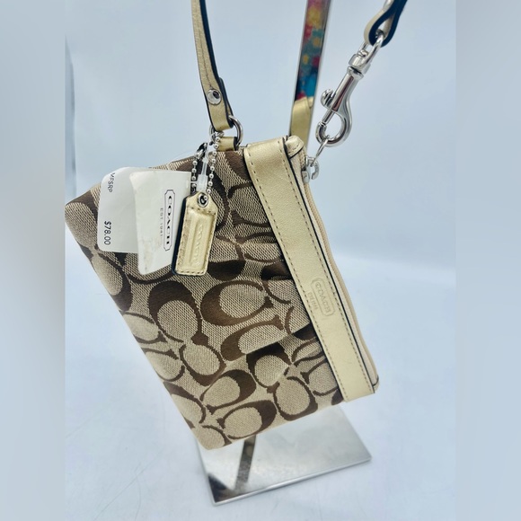COACH SIGNATURE COLLECTION JACQUARD WRISTLET WITH LOGO CHARM  IN KHALI & BRONZE - Picture 3 of 15